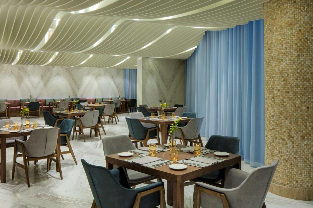 Radisson Blu Hotel Apartment Dubai Silicon Oasis ภายนอก รูปภาพ